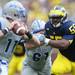 Michigan defensive tackle Jibreel Black looks to take down Air Force quarterback Connor Diets during the first half at Michigan Stadium on Saturday. Melanie Maxwell I AnnArbor.com